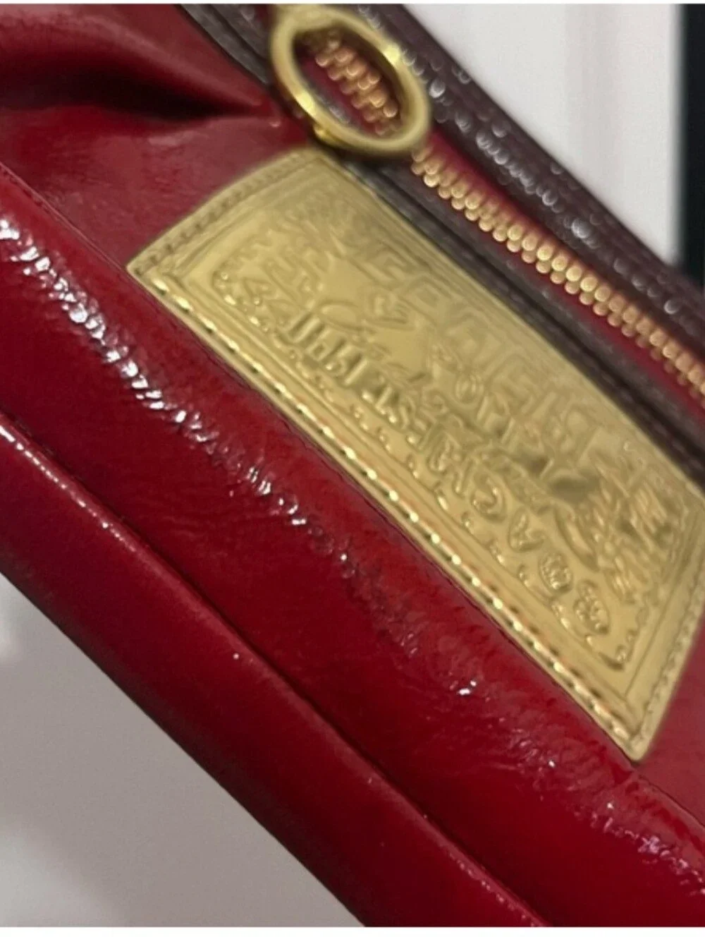 Coach Poppy Red Patent Wristlet with Brass Accents, Minor Callouts, Clean Inside